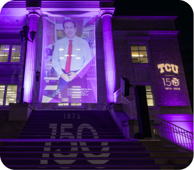 TCU 150 banner featuring Harris College dean Watts 