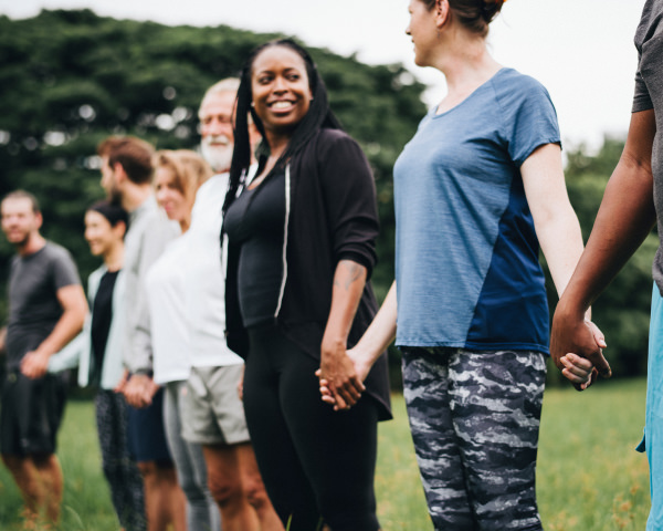 multiethnic people holding hands