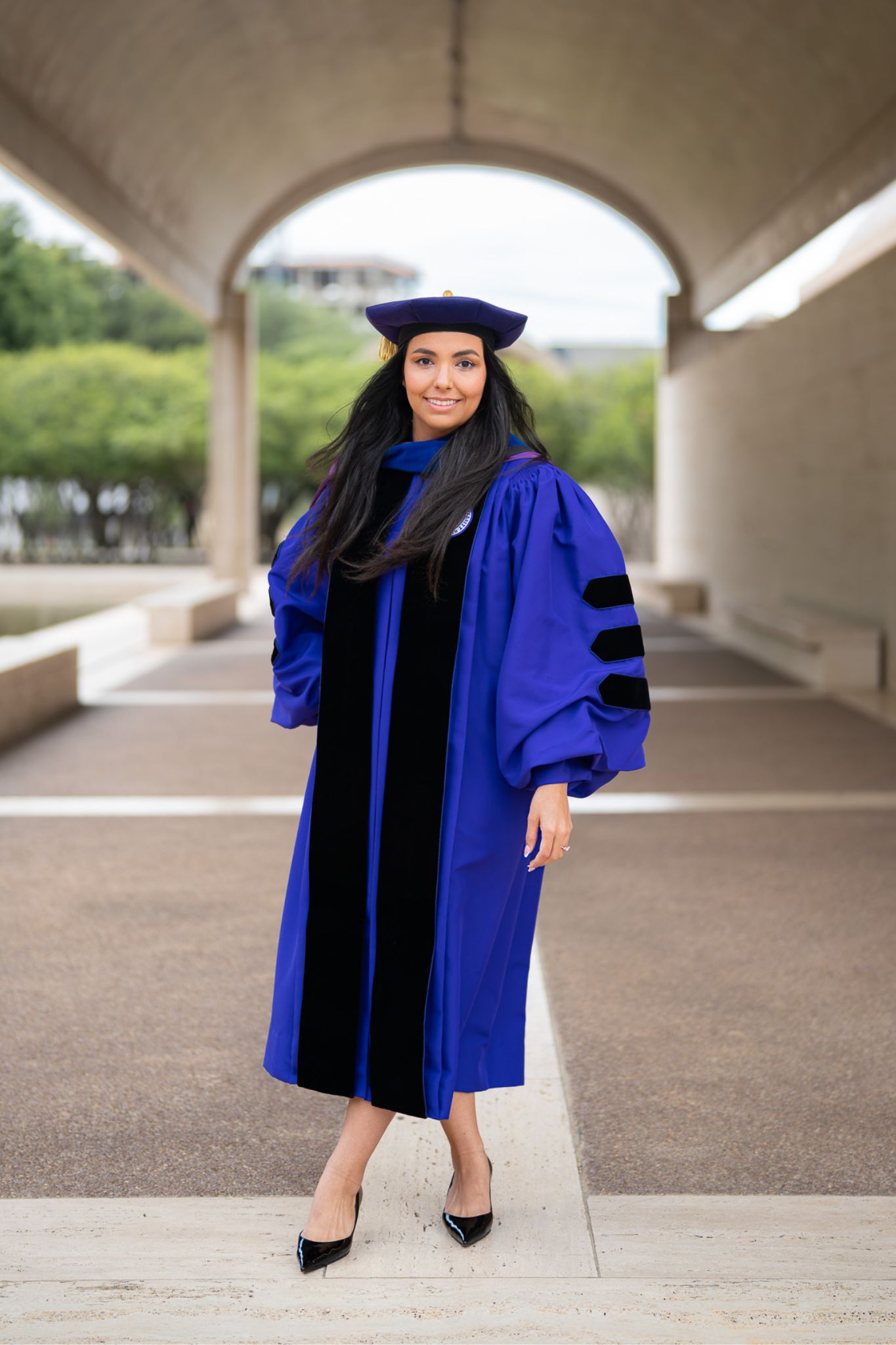 Dr. Haylei Scoggins, Class of 2026, poses in her doctoral regalia from TCU