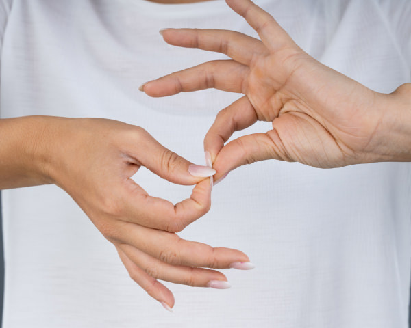 person communicating using ASL signing