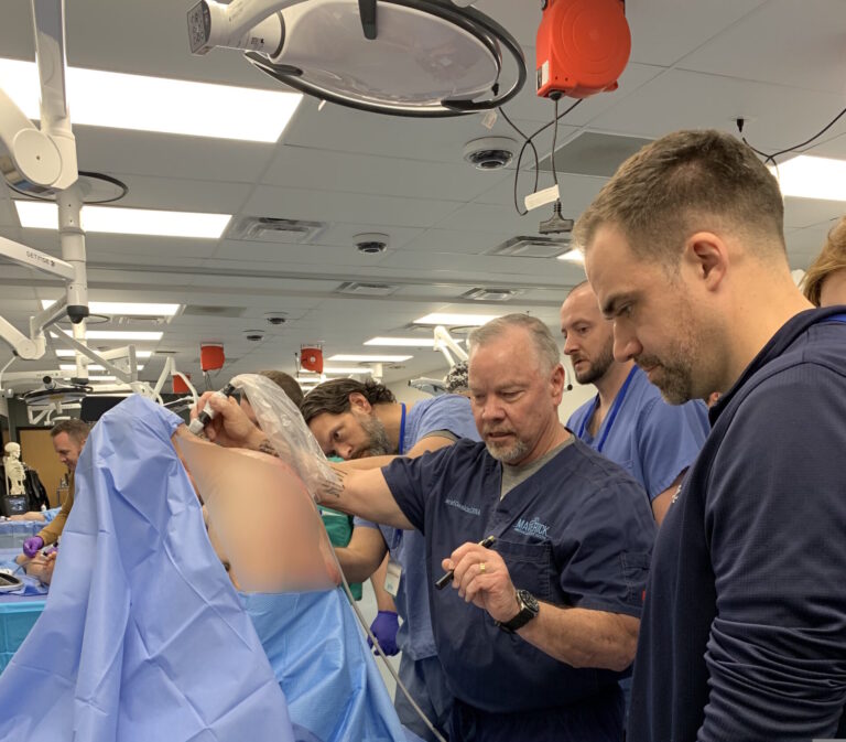 David Gaskin teaching CRNA students how to administer peripheral nerve blocks