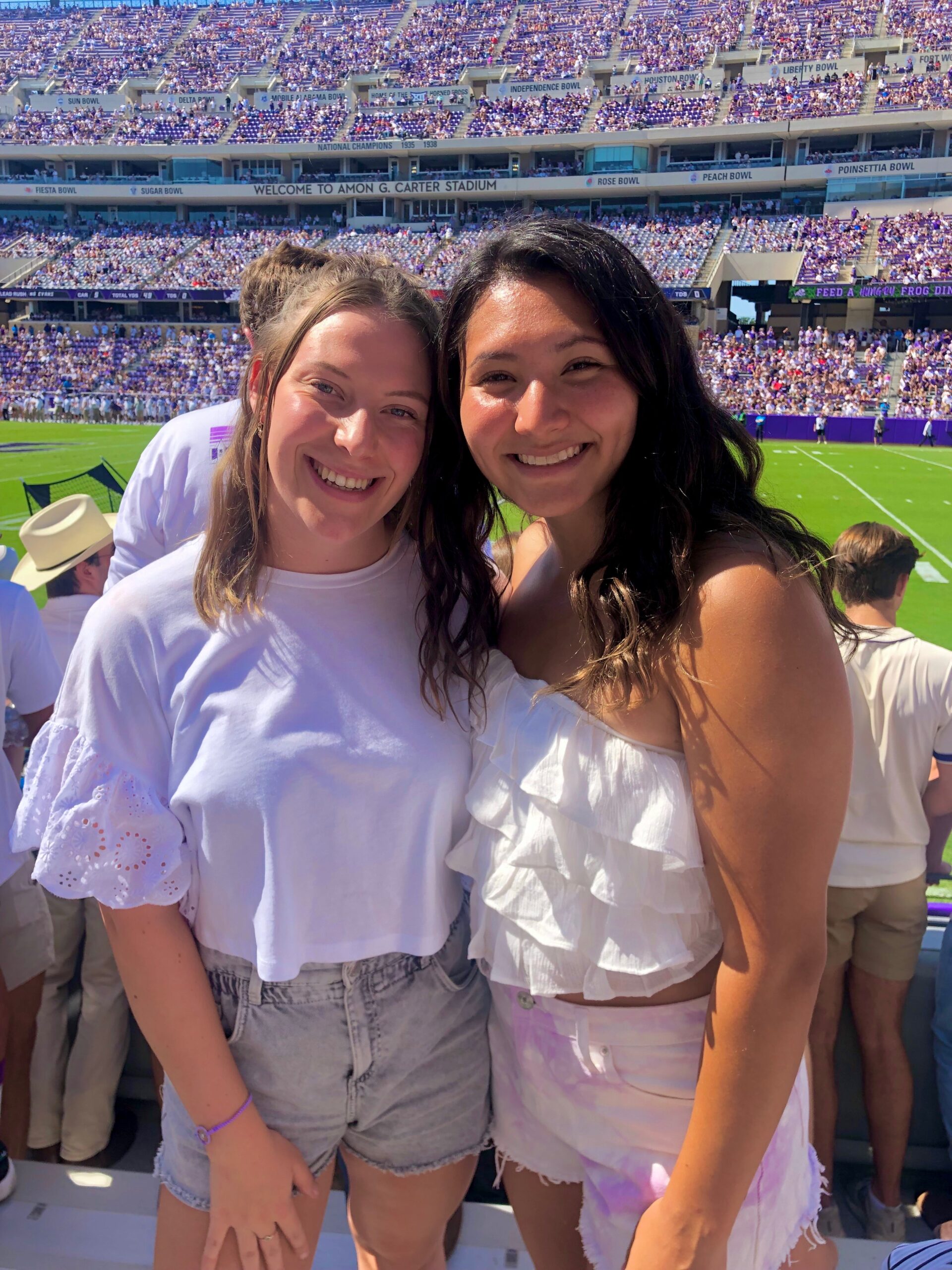 Gracie and her friend at a TCU football game