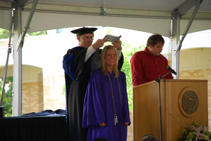 Knickerbocker pictured with John V. Roach Honors College dean Ron Pitcock at her graduation.