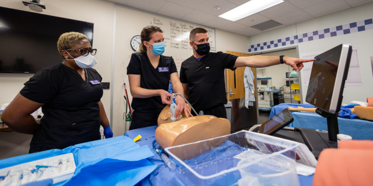 Students in Harris College's Nurse Anesthesia program train in a simulation lab. Photo by James Anger, March 1, 2022