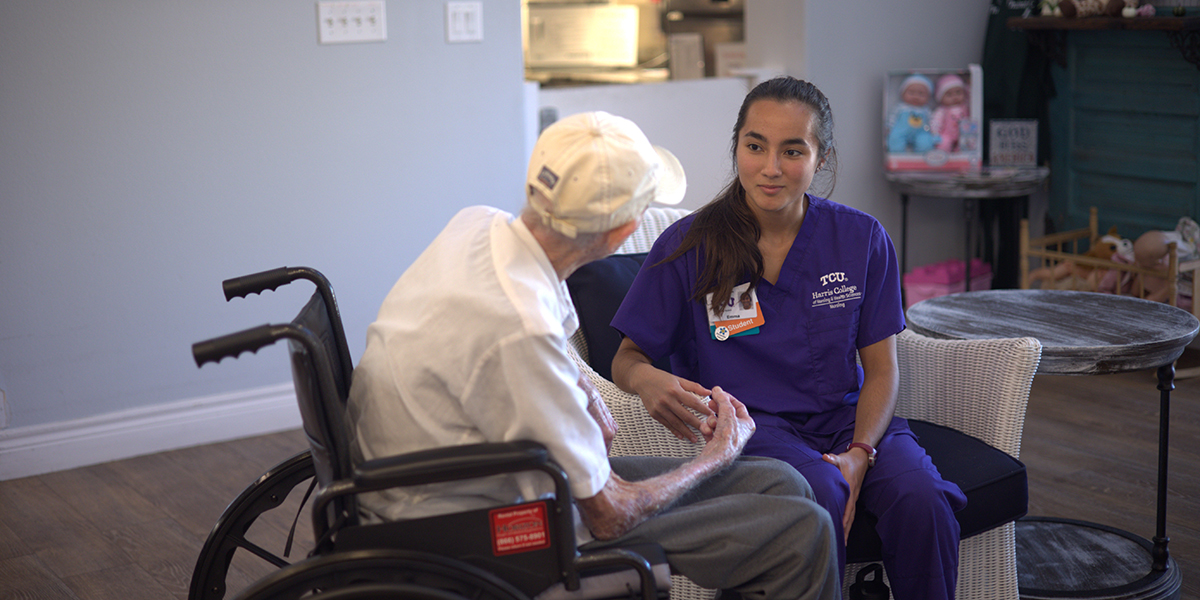 Harris College nursing students working with memory care residents at local senior living center