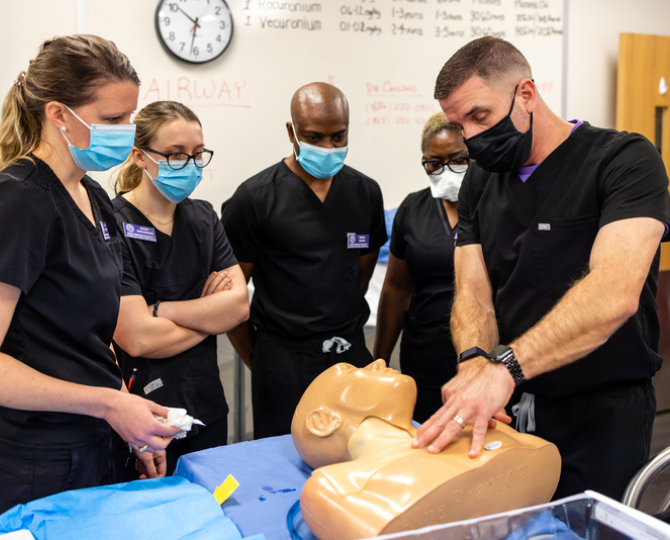 Students in Harris College's Nurse Anesthesia program train in a simulation lab. Photo by James Anger, March 1, 2022